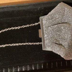 Expressions small metallic clutch with silver link chain